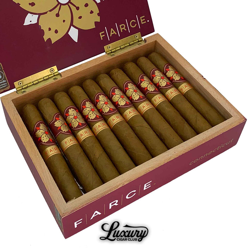 Close up of Room 101 Farce Connecticut Robusto cigars in a red and gold box by Luxury Cigar Club highlighting cigar bands with floral design.
