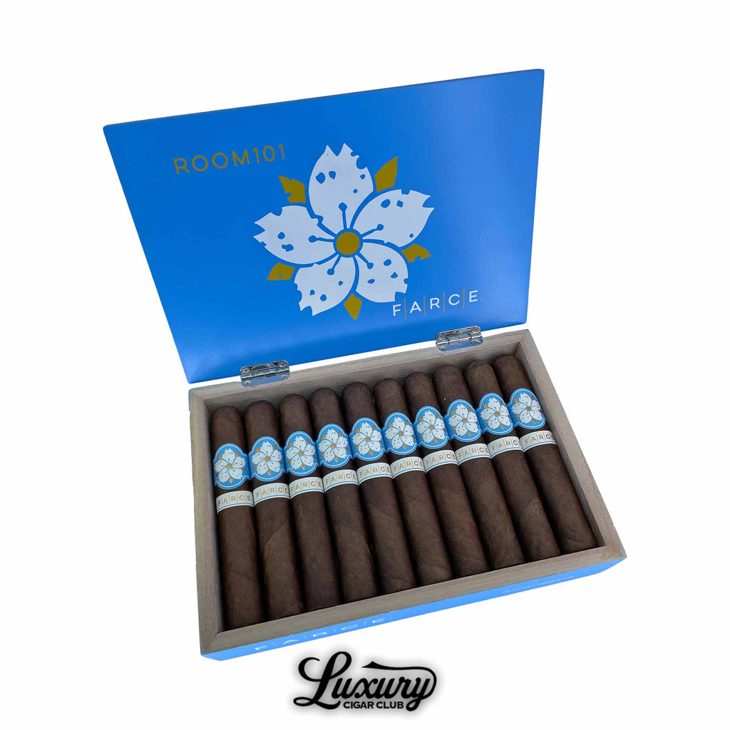 Luxury Cigar Club presentation of Room 101 Farce Nicaragua Gordo, box of 20 premium cigars with bold blue packaging and detailed floral logo.