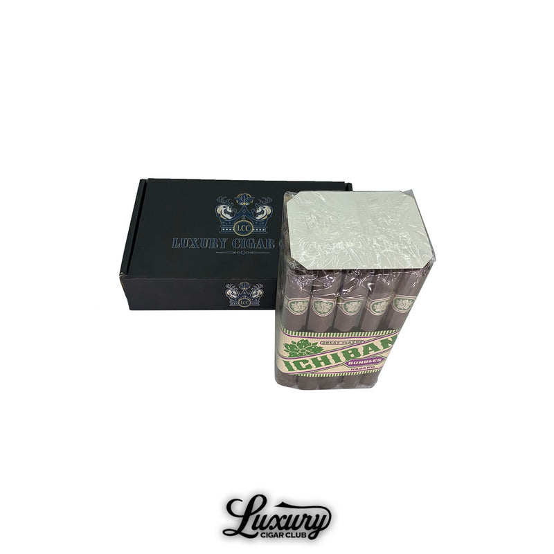 Bundle of Room 101 Ichiban Habano cigars wrapped in factory packaging with green and white branding, placed beside a black Luxury Cigar Club box, available online.