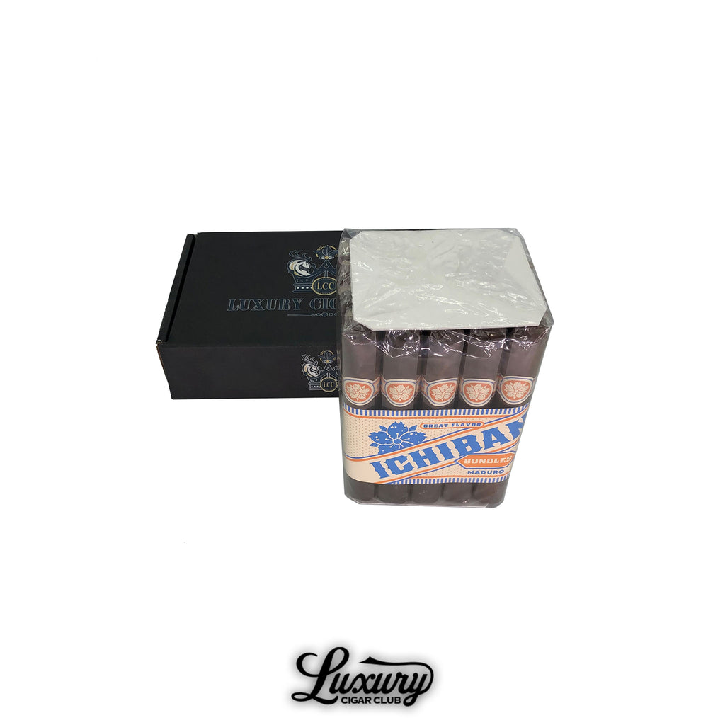 Room 101 Ichiban Maduro bundle of premium cigars in factory packaging placed beside a Luxury Cigar Club branded box.