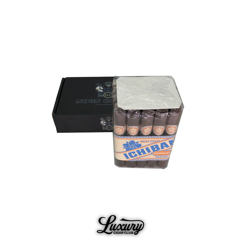 Room 101 Ichiban Maduro bundle of premium cigars in factory packaging placed beside a Luxury Cigar Club branded box.