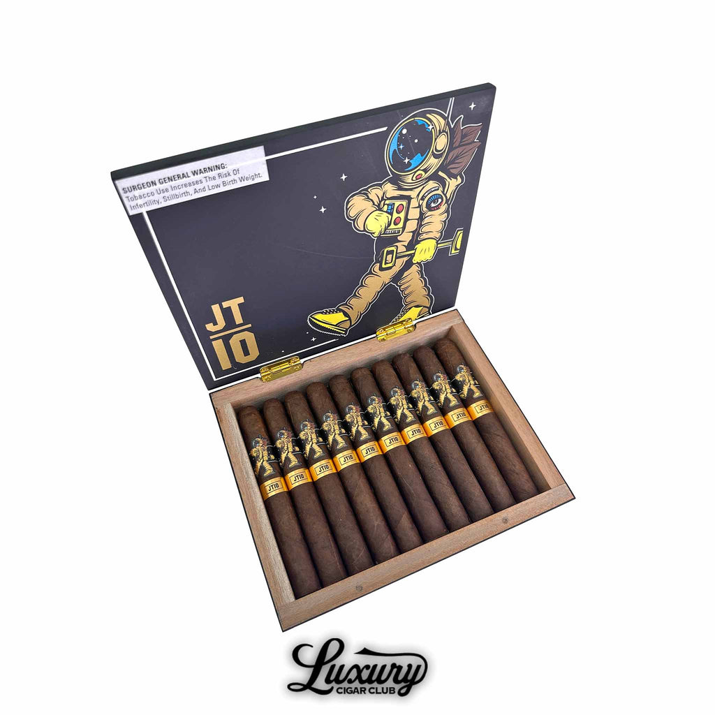Open box of Room 101 Johnny Tobacconaut 10th Anniversary Toro cigars showing 10 premium dark wrapped cigars with astronaut themed bands from Luxury Cigar Club