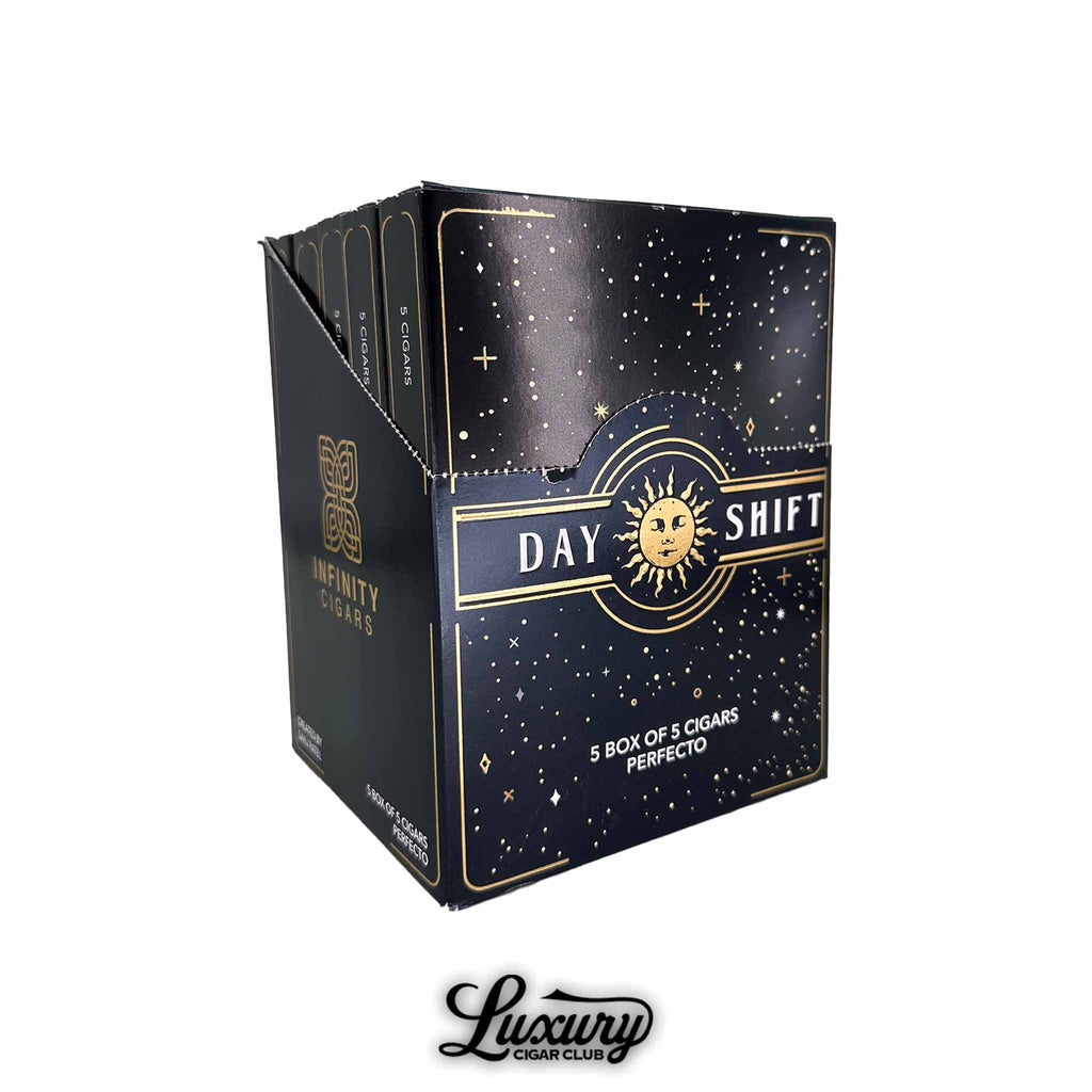Open display box of SP1014 Infinity Day Shift Perfecto cigars, featuring celestial-themed black and gold packaging with "Day Shift" branding and Luxury Cigar Club logo.