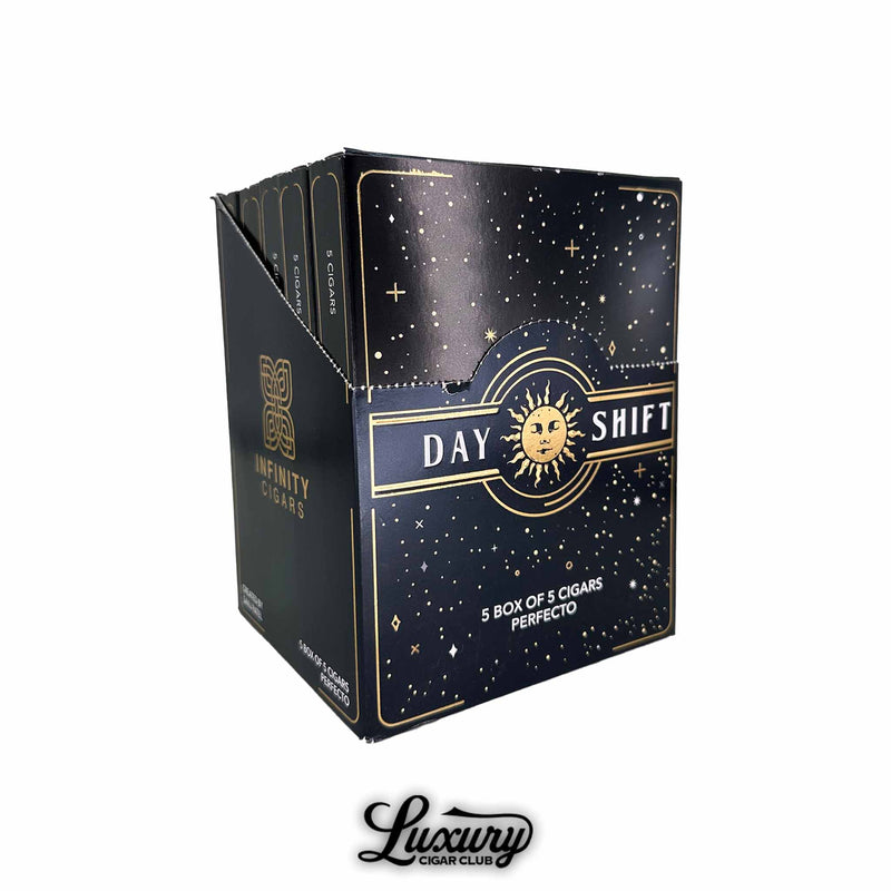 Open display box of SP1014 Infinity Day Shift Perfecto cigars, featuring celestial-themed black and gold packaging with "Day Shift" branding and Luxury Cigar Club logo.
