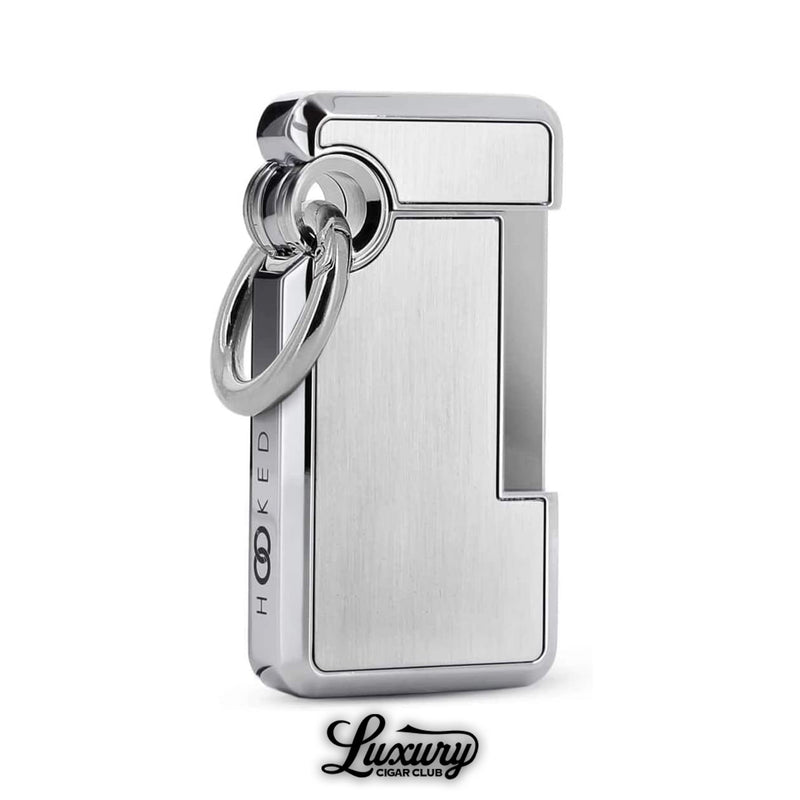 Sleek ST Dupont Hooked single jet lighter in polished silver argento finish with chrome details and oversized keyring loop, elegant pocket accessory for cigar smokers, available at Luxury Cigar Club.