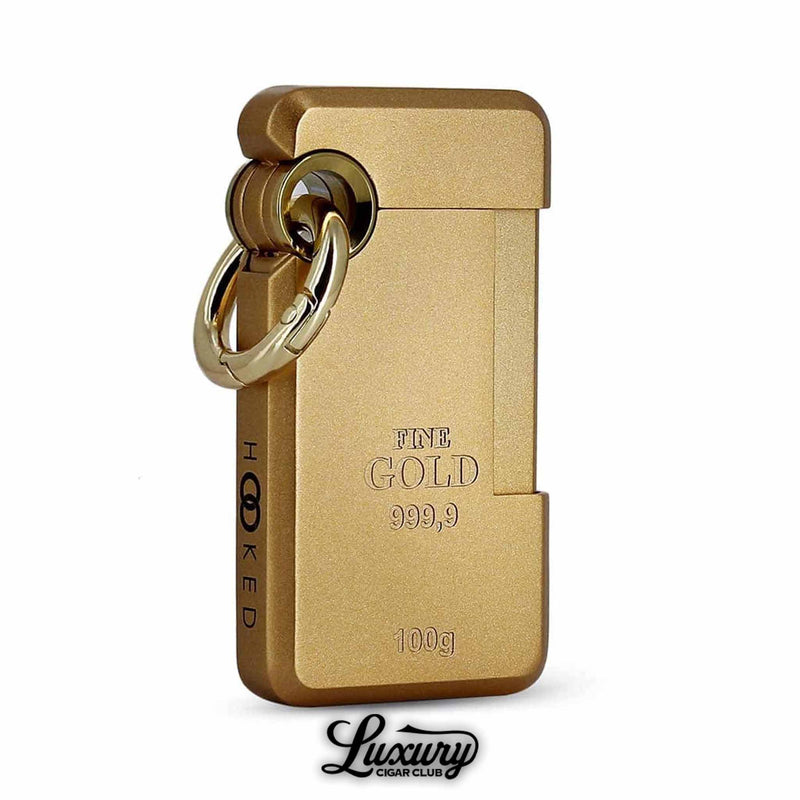 ST Dupont Hooked Single Jet Lighter Lingo edition styled like a gold bar with engraved “Fine Gold 999.9” detailing, gold trim, and signature hook ring, from Luxury Cigar Club.