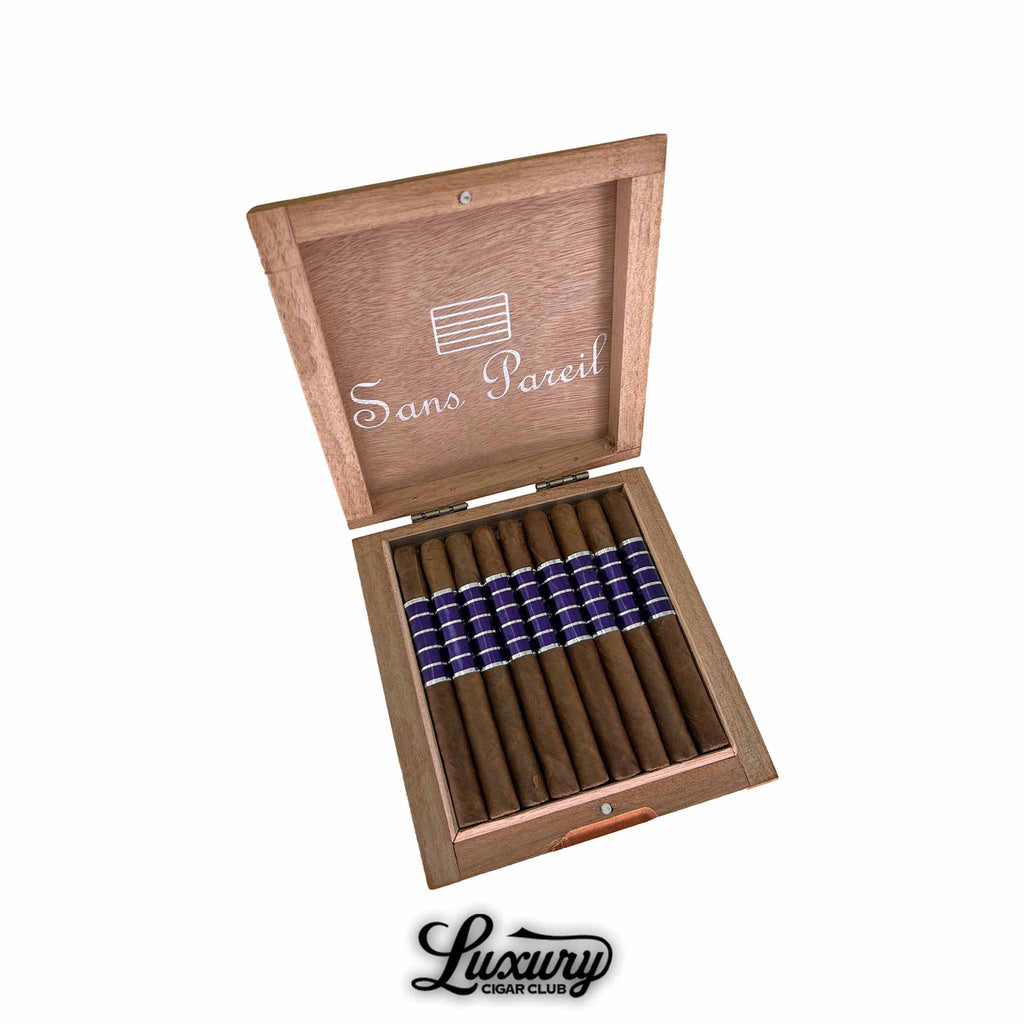 Sans Pareil Purple Laguito cigars arranged in an elegant wooden box with minimalist branding and sleek purple bands, presented by Luxury Cigar Club.