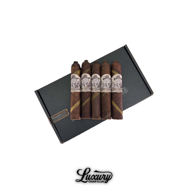 Luxury Cigar Club product photo showing five Sinistro Last Cowboy Maduro Barber Pole Limited Edition Robusto cigars with barber pole wrapper resting on a black Luxury Cigar Club box