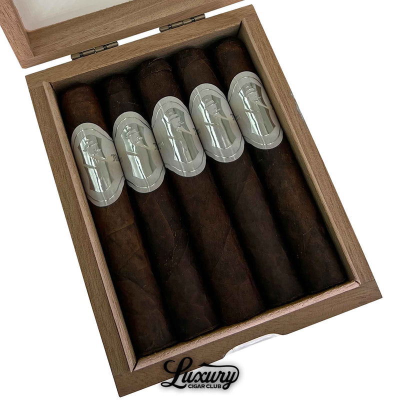 Close-up of Sinistro Mr. White Robusto cigars in a wooden box, showcasing five dark-wrapped cigars with elegant silver embossed bands featuring the Sinistro logo.