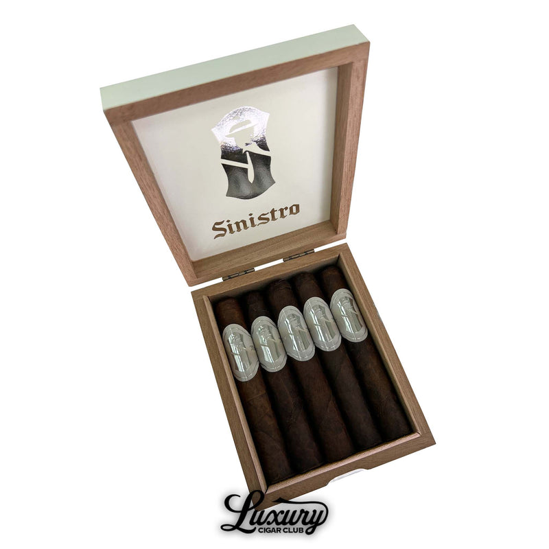 Box of Sinistro Mr. White Robusto cigars opened to reveal five dark-wrapped cigars with metallic silver bands, set inside a clean wooden box with the Sinistro logo displayed on the lid interior.