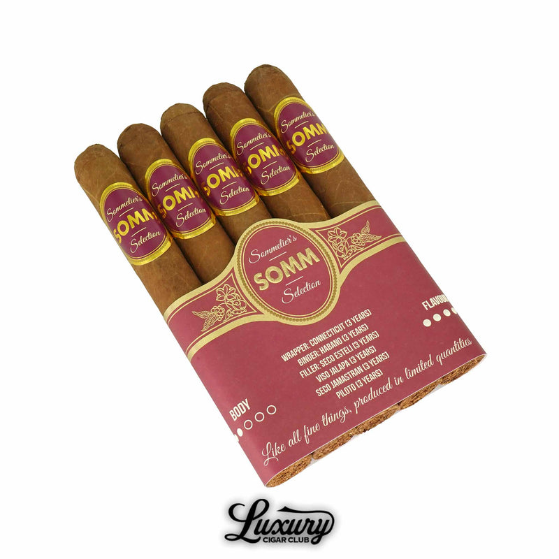 Somm BDX Blanc Toro cigars wrapped in light Connecticut leaf, displaying refined presentation with detailed labeling and premium craftsmanship, featured by Luxury Cigar Club.