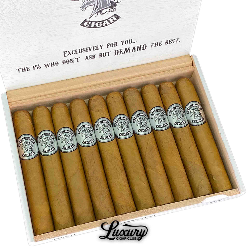 Close-up of Steel Horse Connecticut Robusto cigars neatly arranged inside their box, highlighting the light Connecticut wrapper’s sheen and crisp silver branding. Handcrafted and balanced for refined cigar enthusiasts. Luxury Cigar Club.