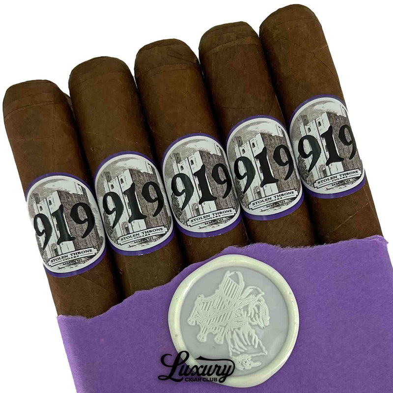 Close-up of Stolen Throne Castle 919 Robusto cigars in purple wrap with white wax seal, premium boutique cigars at Luxury Cigar Club.