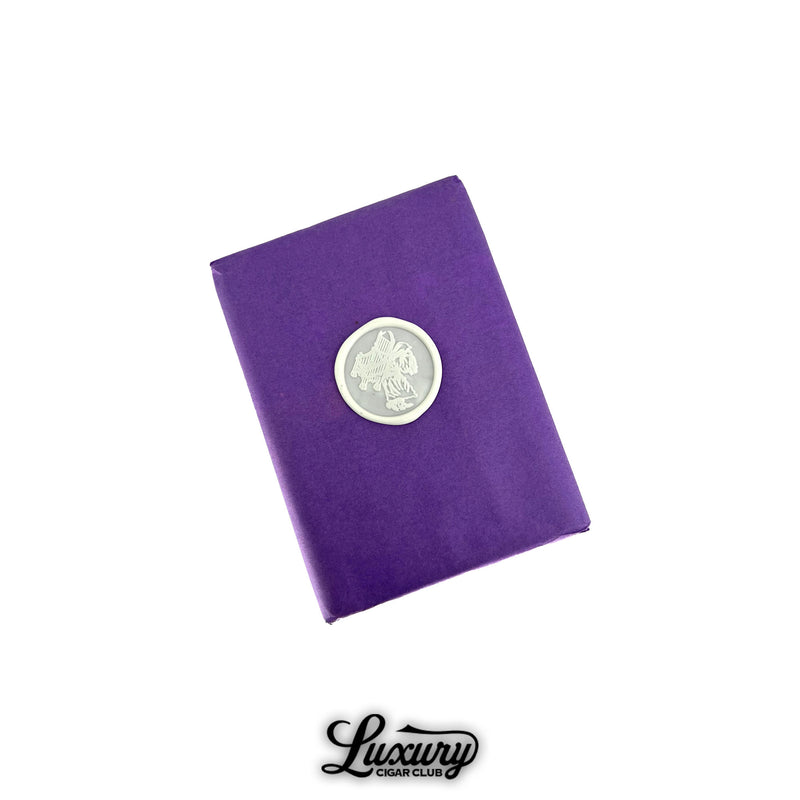 Stolen Throne Castle 919 Robusto cigars bundle wrapped in purple tissue with white embossed wax seal, exclusive cigars from Luxury Cigar Club.
