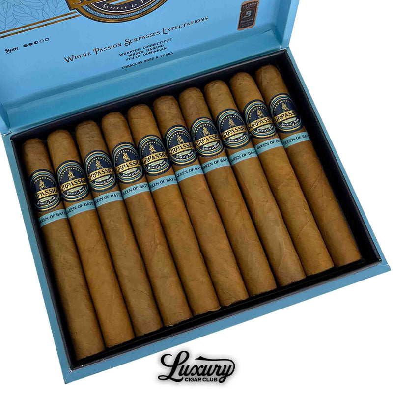 Close-up of Surpassion Queen of Battle Toro cigars inside an open blue box, featuring Connecticut wrappers and detailed blue and gold cigar bands, Luxury Cigar Club exclusive.