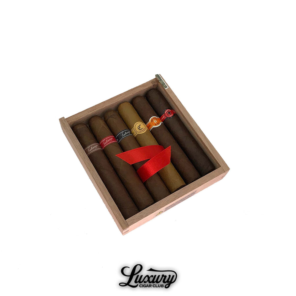 Tatuaje Colecciones Robusto Exclusivos cigar sampler featuring a mix of premium blends in a wooden box, presented by Luxury Cigar Club.