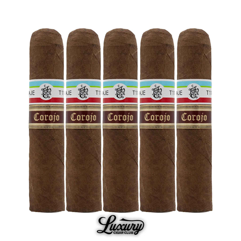 Five Tatuaje T110 Corojo cigars side by side with decorative cream, gold, and Corojo brown bands, placed above the Luxury Cigar Club logo.