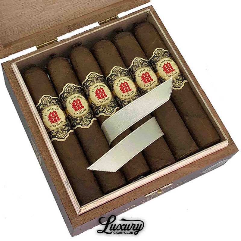 Close-up of Tatuaje La Mission de L’Atelier 1959 box showing detailed cigar bands and rich brown wrappers at Luxury Cigar Club