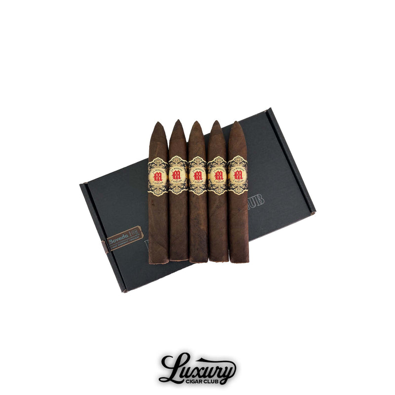 Five Tatuaje La Mission de L’Atelier 1982 cigars with pointed figurado shape displayed on Luxury Cigar Club packaging