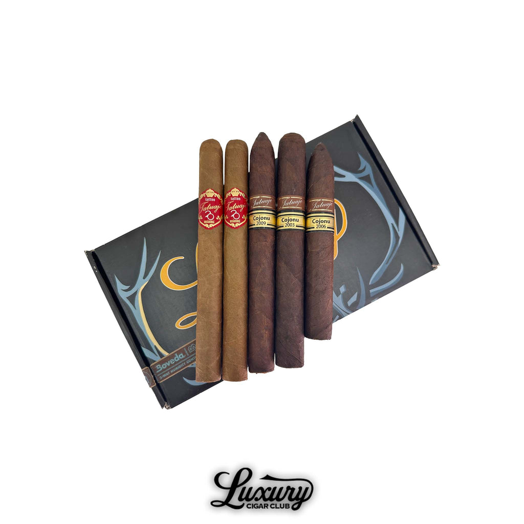 Tatuaje Legends and Legacy Sampler with Luxury Cigar Club Logo. Box featuring five premium Tatuaje cigars, including 20th Anniversary and Cojonu series, displayed on a branded sampler box.