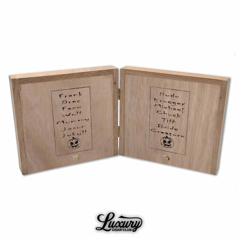 Exterior view of the Tatuaje Monster Smash Limited Edition Sampler box engraved with names of iconic monsters such as Frank, Wolf, Mummy, Krueger, and Bride. Luxury Cigar Club branding beneath.