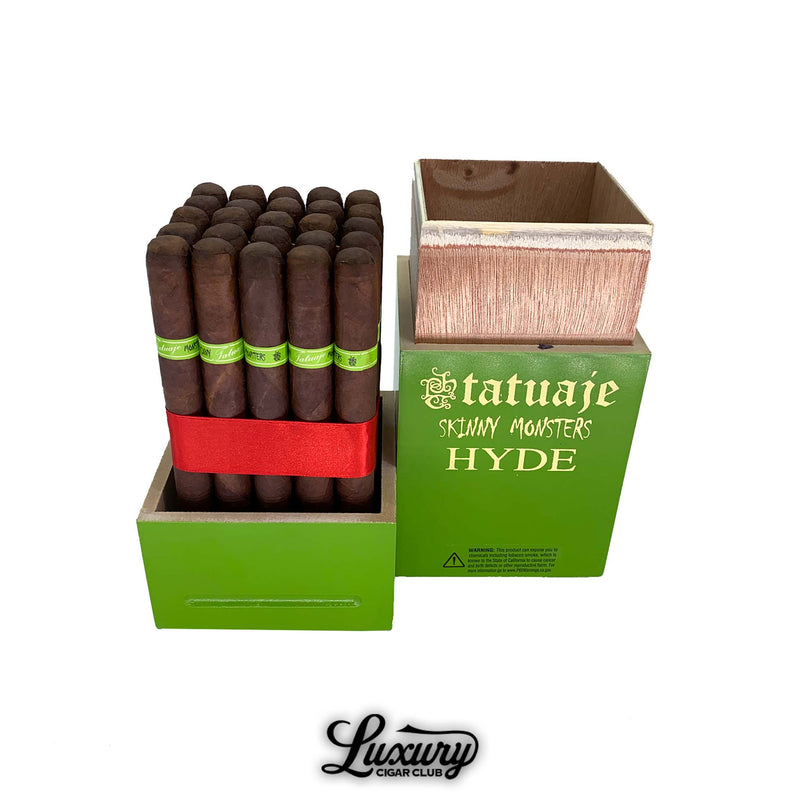 Open green box of Tatuaje Skinny Monsters Hyde cigars with 25 petit lancero cigars bundled in a red ribbon, each featuring a bright green Hyde band, displayed beside the lifted box lid on a white background.