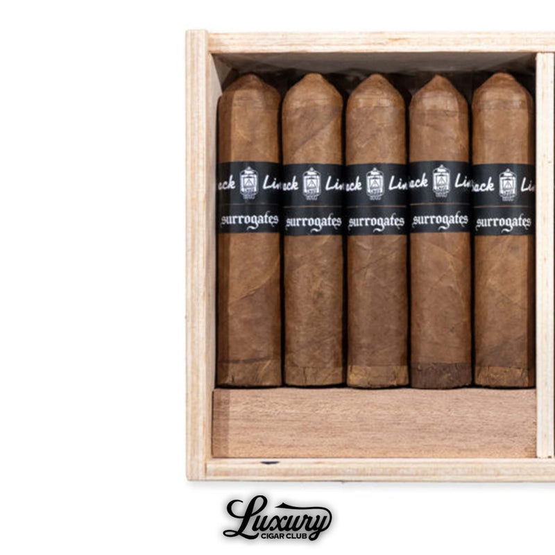 Close-up of Tatuaje Surrogates Back Line EL454 cigars in a wooden box from Luxury Cigar Club.