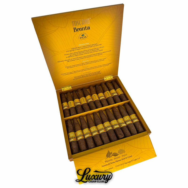 Open box of Toscano Brenta cigars with yellow interior and 20 dark brown cigars featuring gold bands, Luxury Cigar Club branding