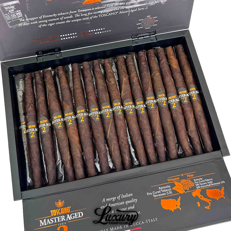 Close-up of Toscano Master Aged Serie 2 cigar box showing detailed craftsmanship, fire-cured wrappers, and map artwork indicating U.S. tobacco origins, featured by Luxury Cigar Club.
