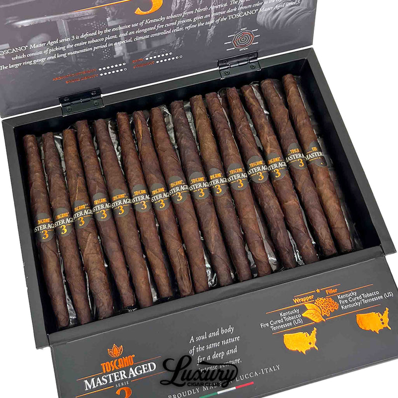 Close-up of Toscano Master Aged Serie 3 cigar box revealing rustic cigar textures, detailed branding, and American tobacco sourcing graphics, displayed for Luxury Cigar Club.