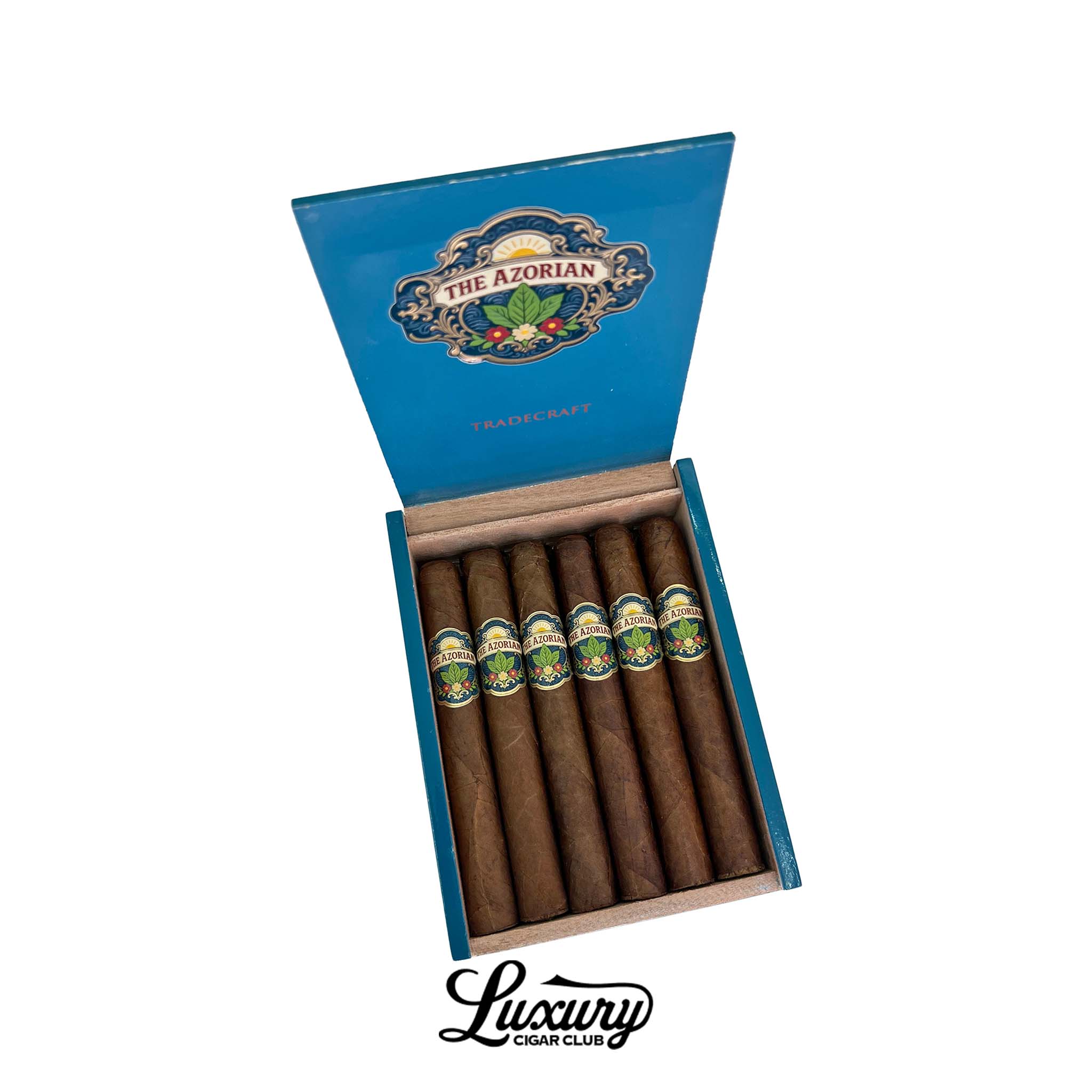 Open blue Tradecraft Azorian Corona Gorda cigar box displaying six medium-brown cigars with colorful Azorian bands featuring floral and tobacco leaf artwork inside a natural wood interior. Luxury Cigar Club.
