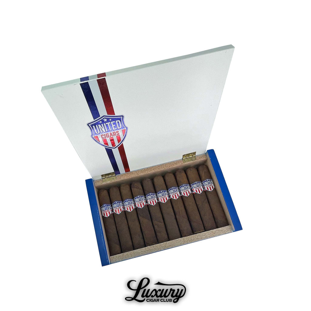 United Cigars Maduro Robusto cigars in an open red white and blue box with United Cigars shield logo on the lid at Luxury Cigar Club