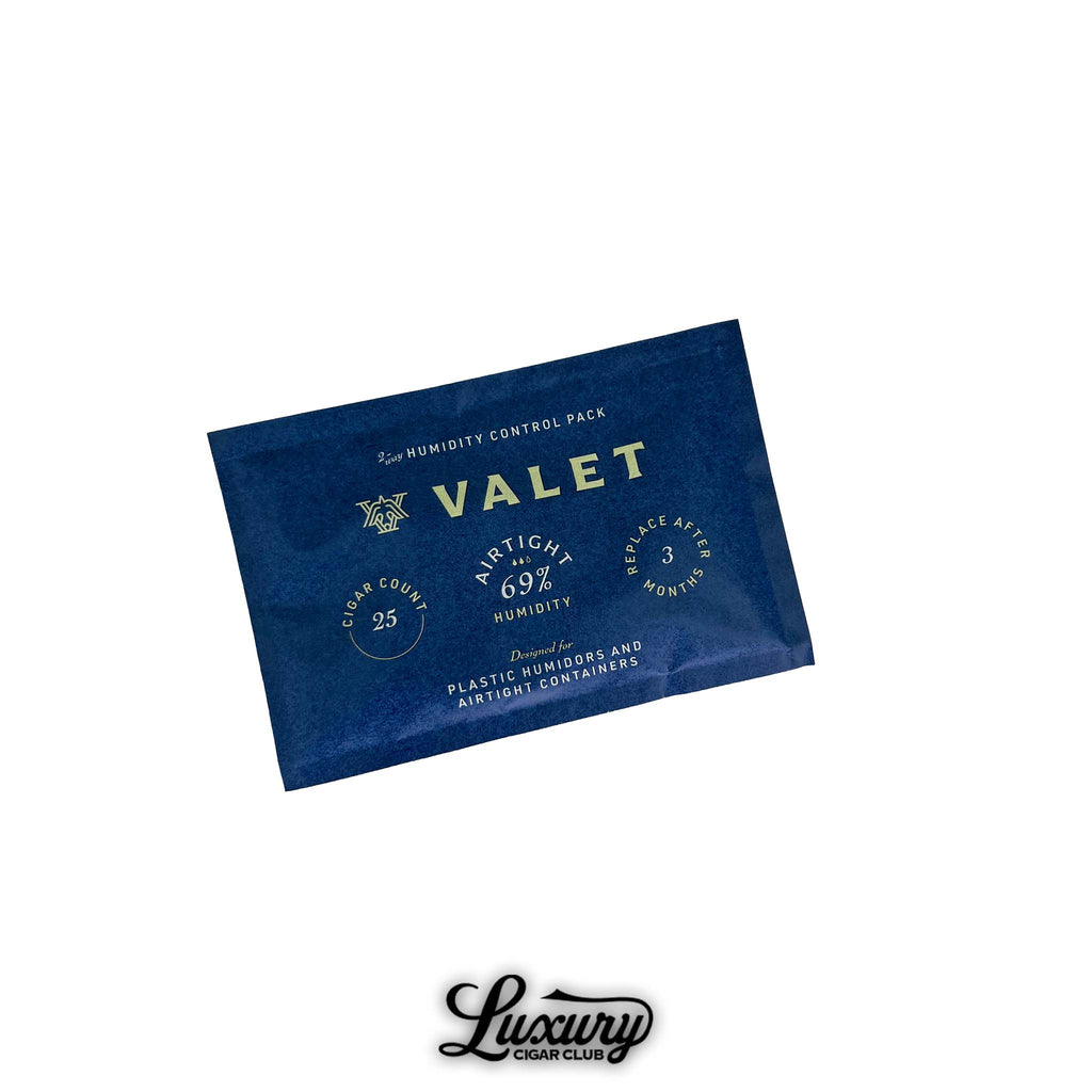 Valet 2-Way Humidification Control Pack for cigars, featuring a blue design with gold lettering indicating 69% humidity, 25-cigar capacity, and 3-month usage period. Designed for plastic humidors and airtight containers. Luxury Cigar Club logo appears below.