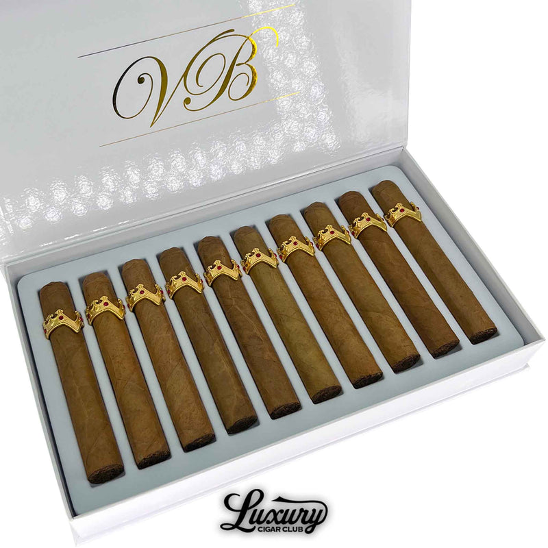 Close-up of Vicente Blends Royalty Collection Honour Toro Masterpiece cigars featuring golden crown-shaped bands and flawless construction, presented by Luxury Cigar Club.