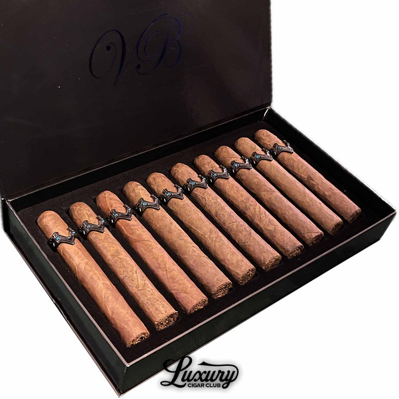 Close-up of Vicente Blends Royalty War Collection Toro Masterpiece cigars showing their refined craftsmanship and distinctive black crown bands, featured by Luxury Cigar Club.