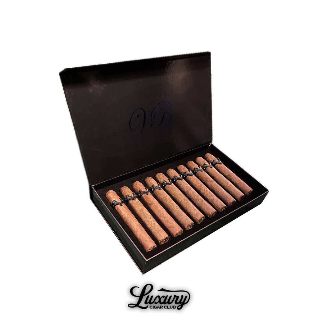 Vicente Blends Royalty War Collection Toro Masterpiece cigars displayed in a sleek black box with the VB insignia, exuding sophistication and modern luxury, available at Luxury Cigar Club.