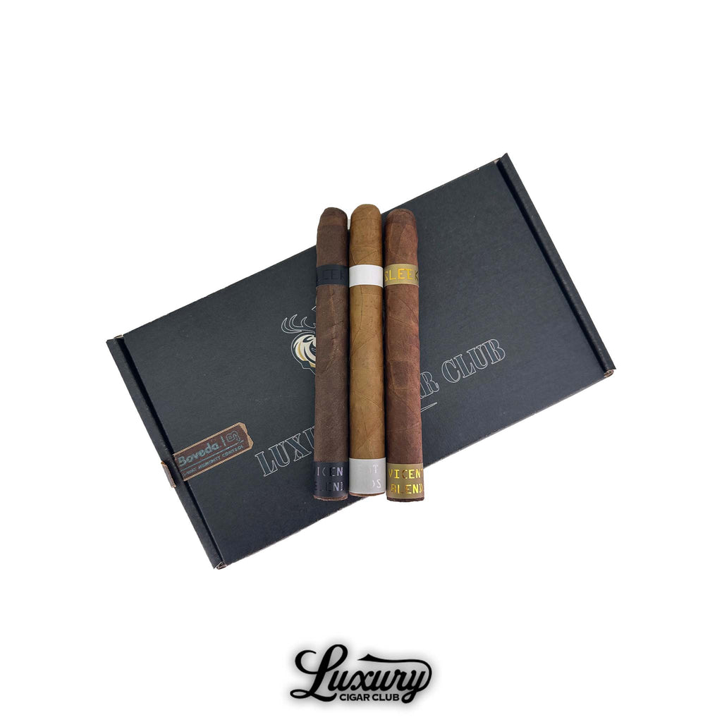 Vicente Blends Sleek cigar sampler featuring three premium cigars with dark, natural, and light wrappers on a black Luxury Cigar Club box.