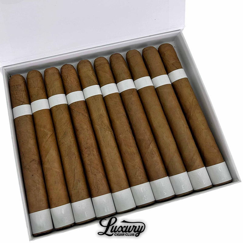 Close-up of Vicente Blends Sleek White Churchill cigars arranged neatly in a white box, each with a clean white band and smooth Connecticut wrapper. Luxury Cigar Club logo beneath.