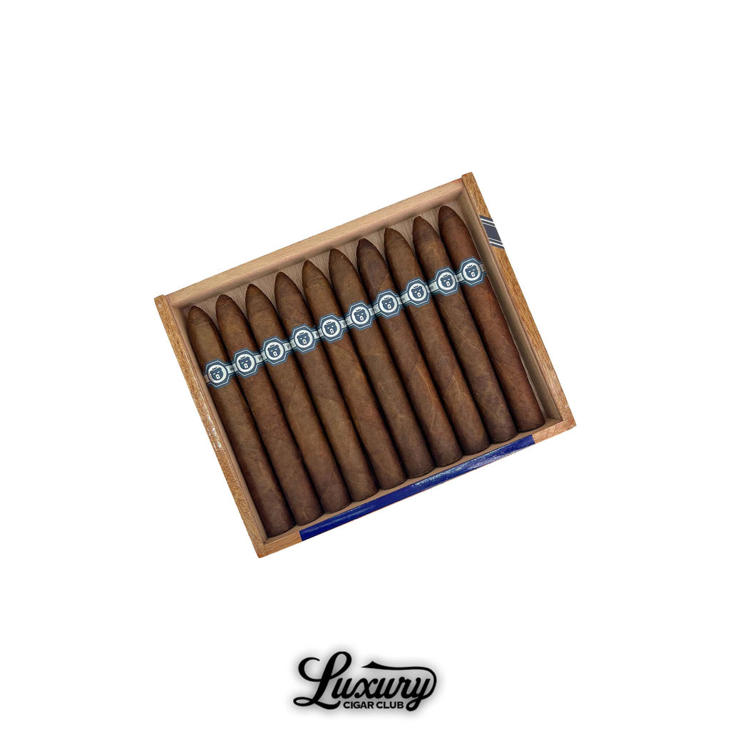 An open cedar box of El Oso Limited Edition 2025 Belicoso cigars in dark wrappers with bold navy and silver bands, arranged neatly in rows.