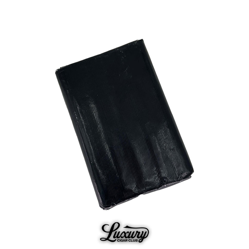 Wrapped five-pack of Warped Miami Maduro 475 Petit Churchill cigars in black paper packaging, produced exclusively for Luxury Cigar Club.