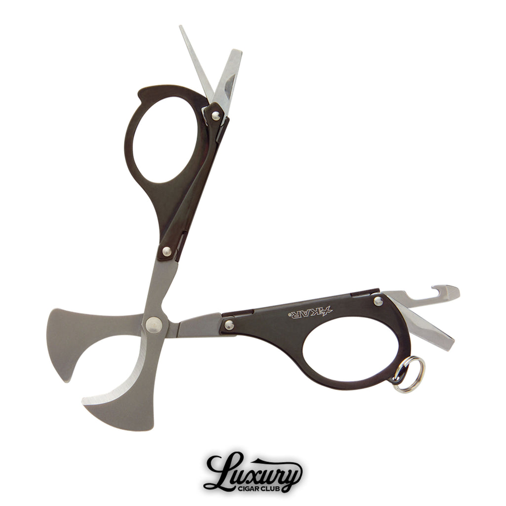 Xikar MTX Multi-Tool open view in black finish showing cigar scissors, screwdriver, and bottle opener, available at Luxury Cigar Club