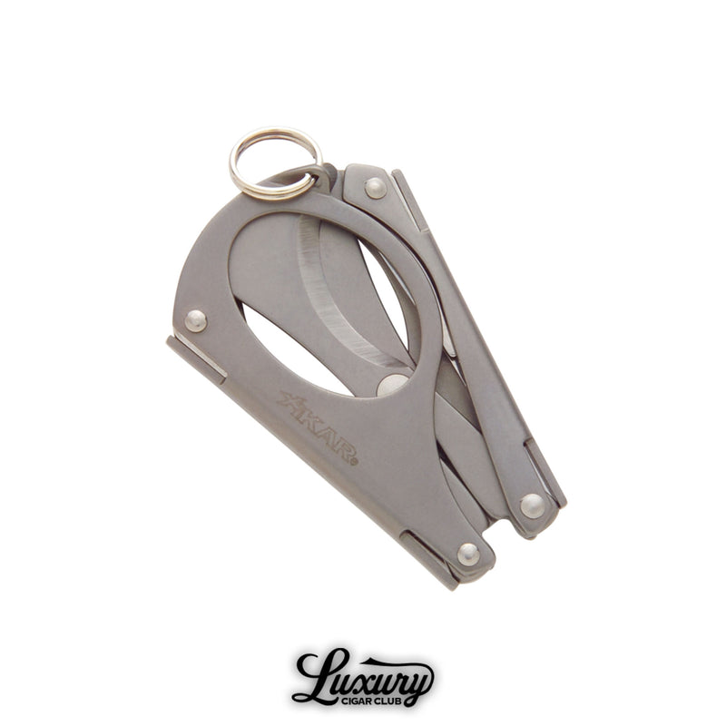 Xikar MTX Multi-Tool cigar scissors in chrome silver finish with key ring attachment, available at Luxury Cigar Club