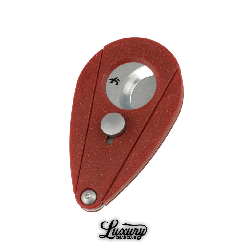 Xikar Xi2 cigar cutter in bloodstone red finish available at Luxury Cigar Club, crafted with durable construction and sharp double blades for consistent performance.