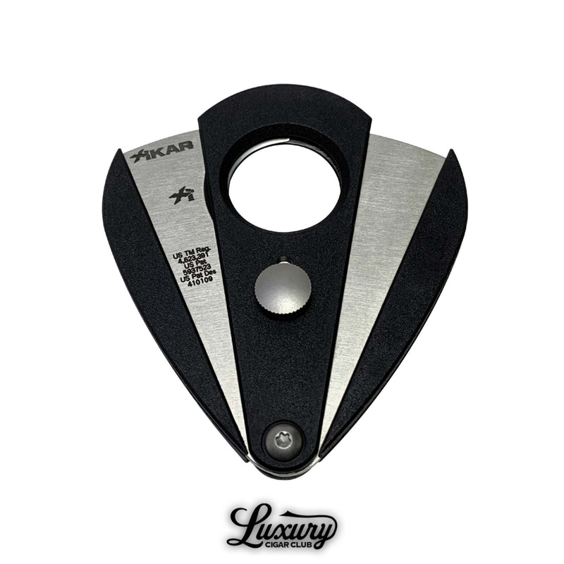 Xikar Xi2 cigar cutter in noir black open view available at Luxury Cigar Club, showcasing stainless steel double guillotine blades for premium cigar preparation.