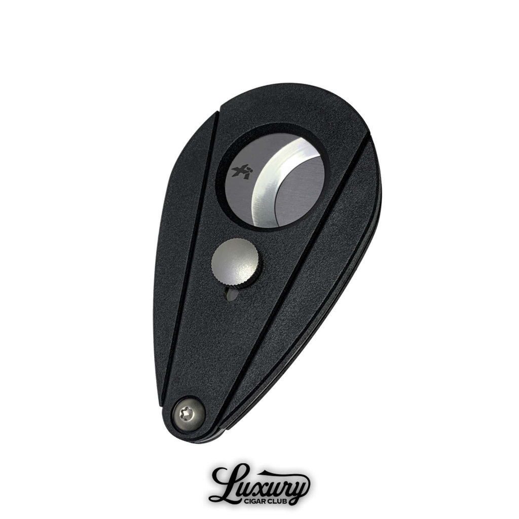 Xikar Xi2 cigar cutter in noir black finish available at Luxury Cigar Club, designed with sharp stainless steel double guillotine blades and a teardrop shape.