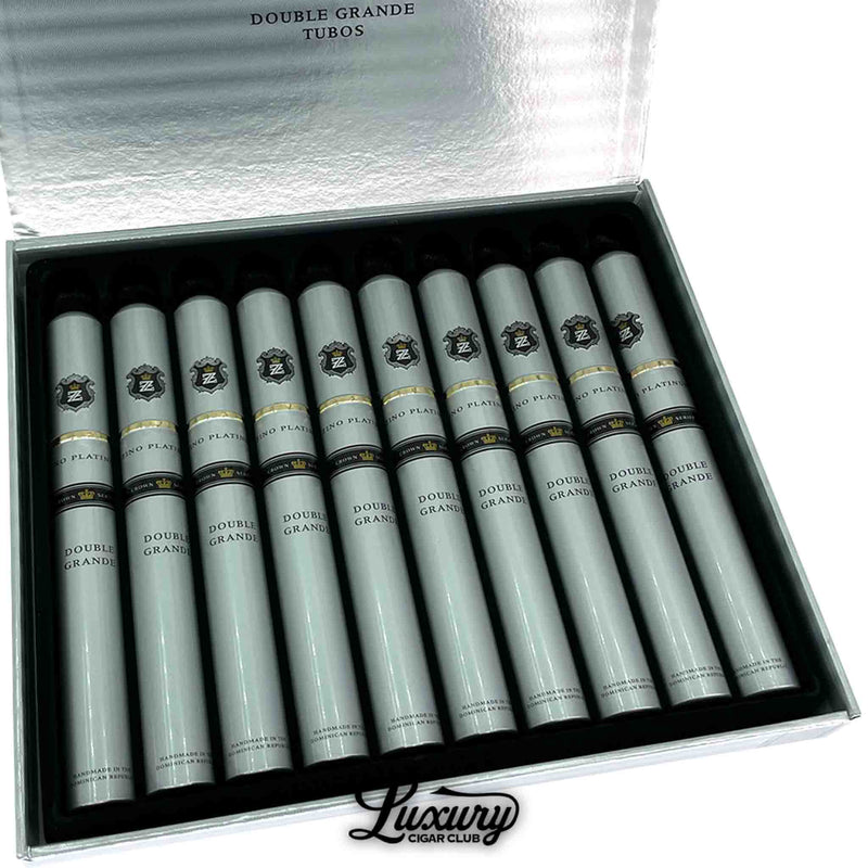 Close-up of Zino Platinum Crown Series Double Grande Tubo cigars highlighting the refined silver tubes and signature Zino crest, presented by Luxury Cigar Club.