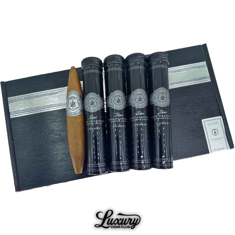 Zino Platinum Scepter Series Chubby Tubo 5-pack with black aluminum tubes and one exposed cigar featuring a natural brown wrapper, arranged on a black box with silver trim, presented by Luxury Cigar Club.