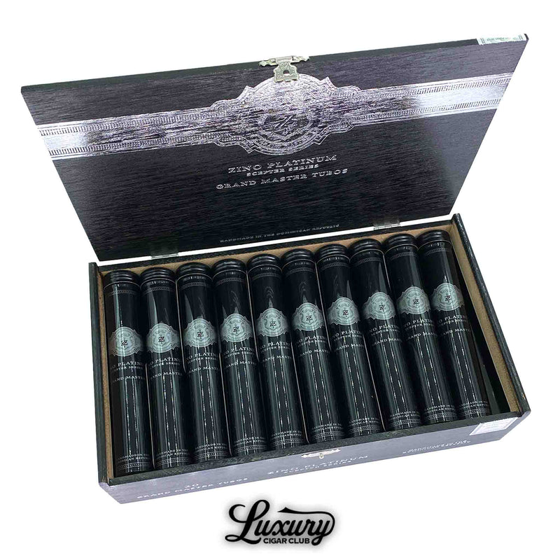 Zino Platinum Scepter Series Grand Master Tubo cigars arranged in a sleek black box with silver embossed branding, each cigar encased in glossy black aluminum tubes, presented by Luxury Cigar Club.